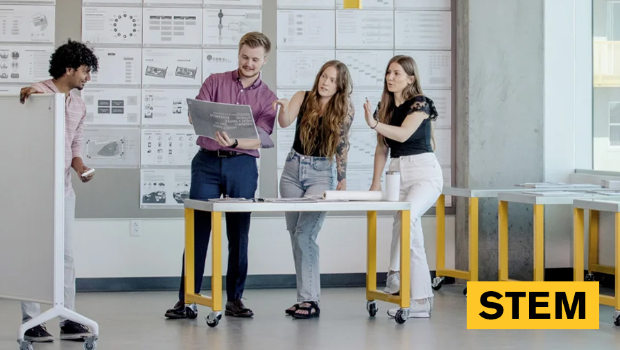 Students gathered around a table